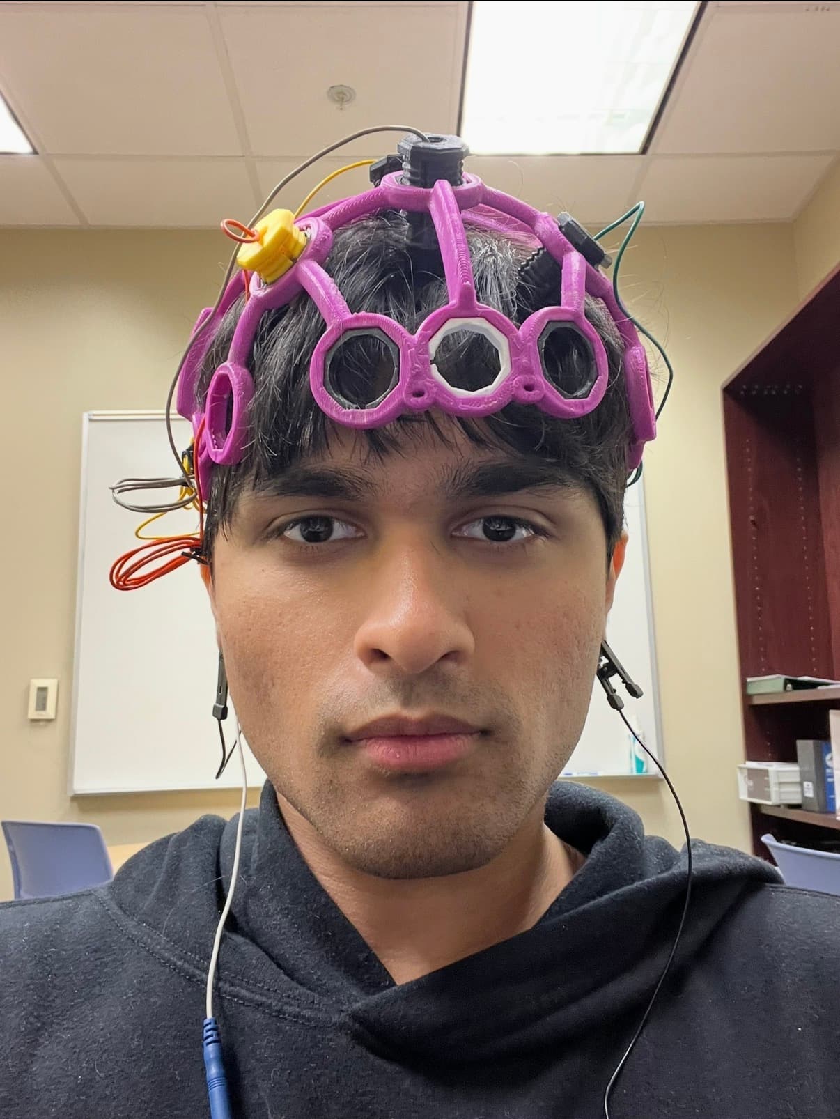 Rafan wearing a sensor headset