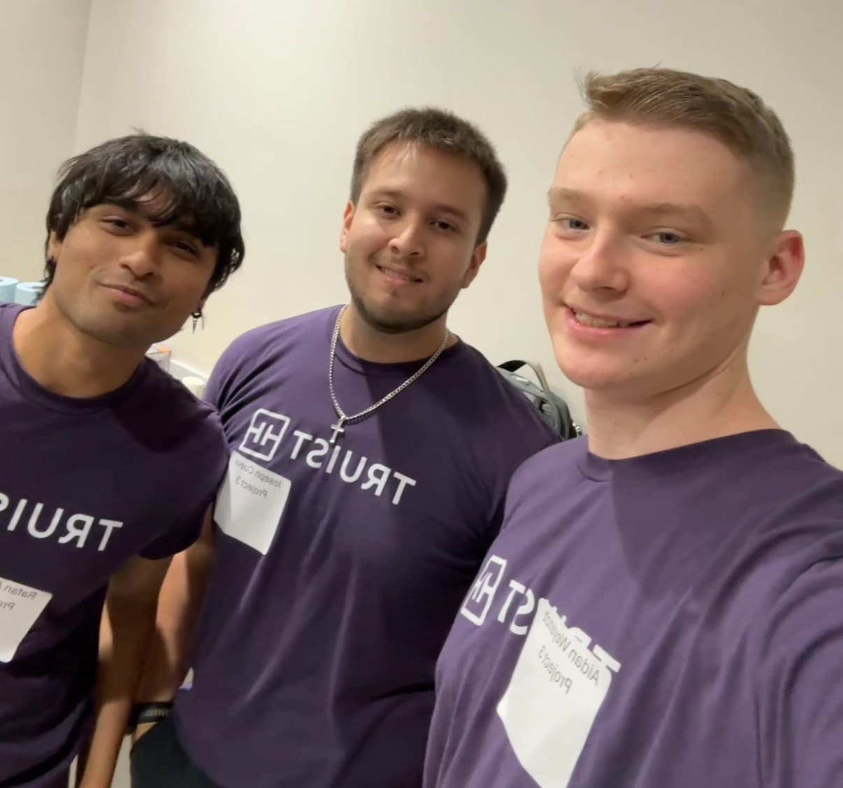 Rafan with two people wearing Truist shirts